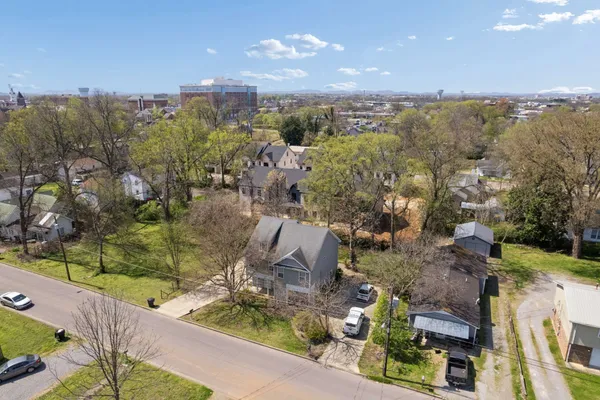 an aerial view of a city with lots of residential buildings