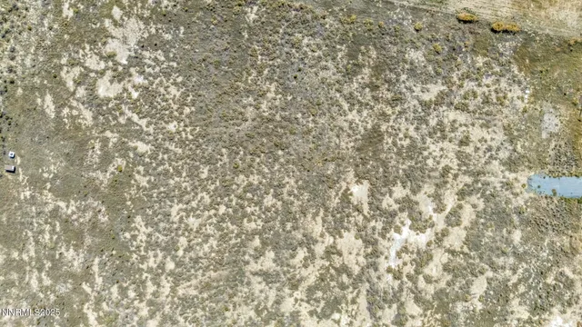 a view of an ocean and a mountain