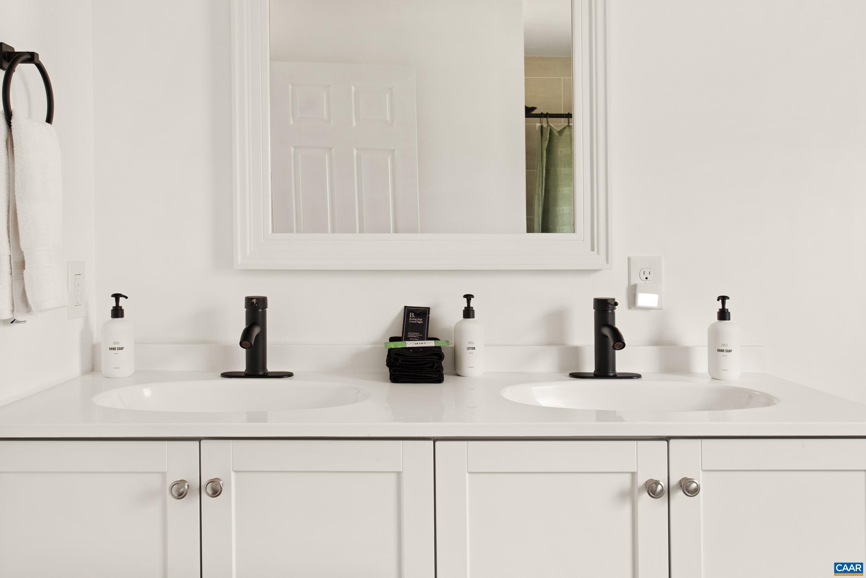 1795 Avon Road Afton, VA 22920 - Photo 20 of 39 a bathroom with sink and mirror