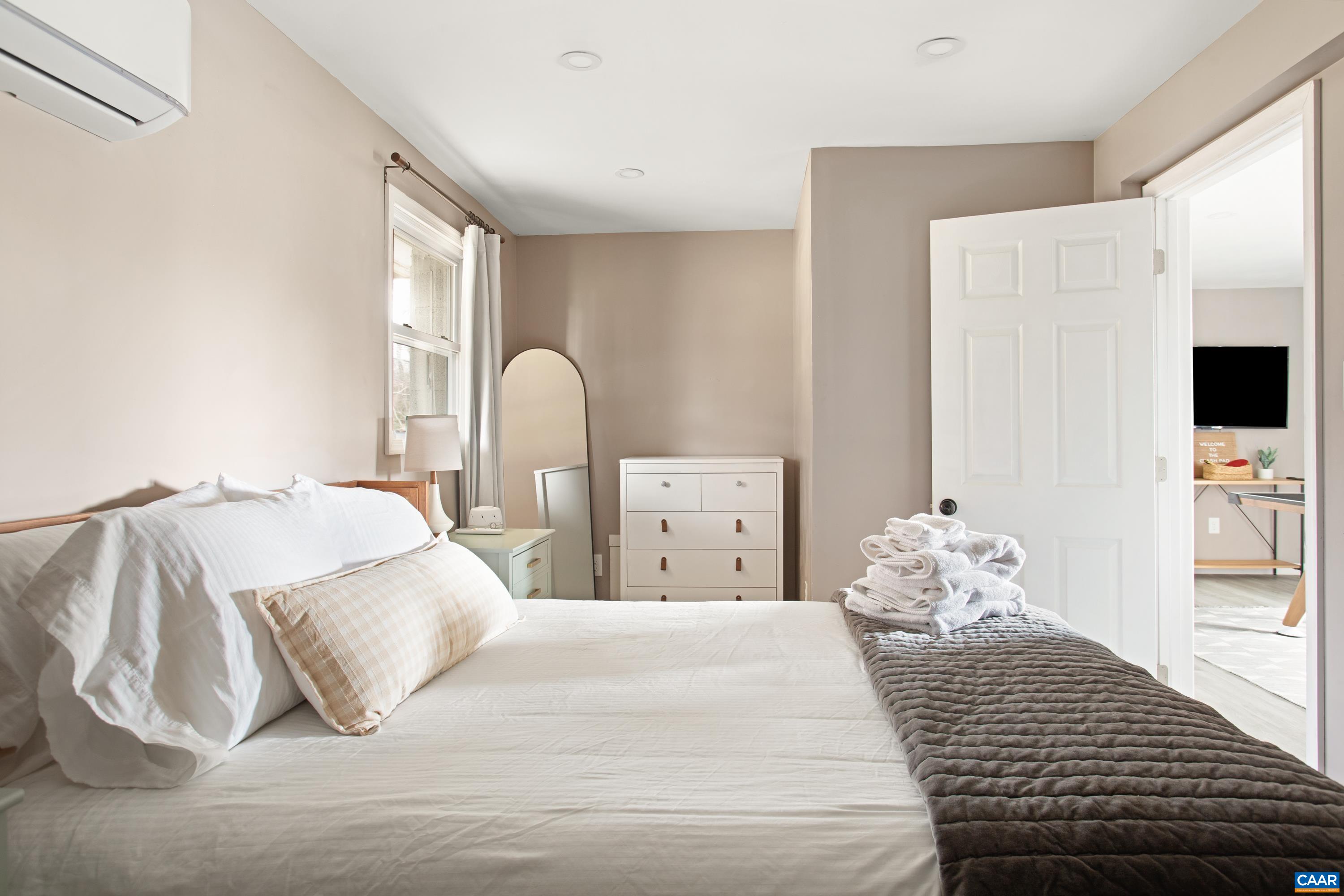1795 Avon Road Afton, VA 22920 - Photo 24 of 39 a bedroom with a bed and a window