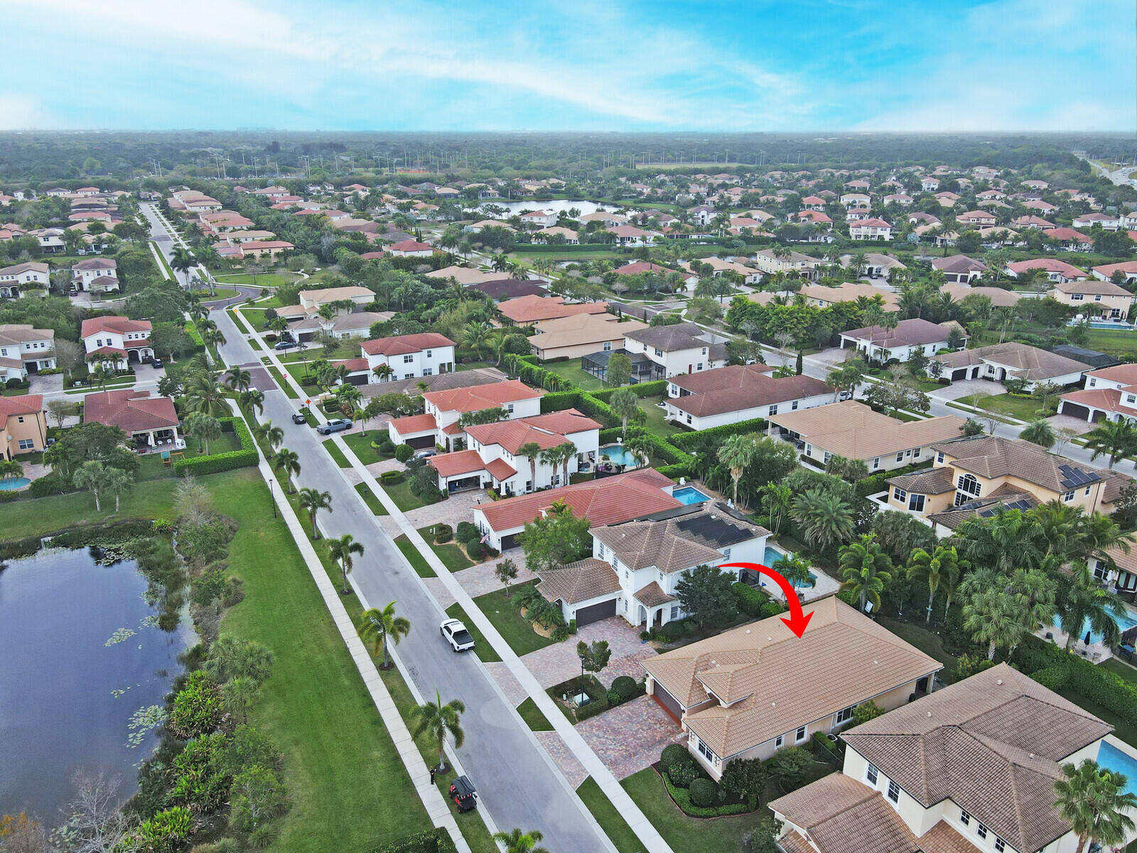 212 Behring Way Jupiter, FL 33458 - Photo 2 of 56 an aerial view of multiple house