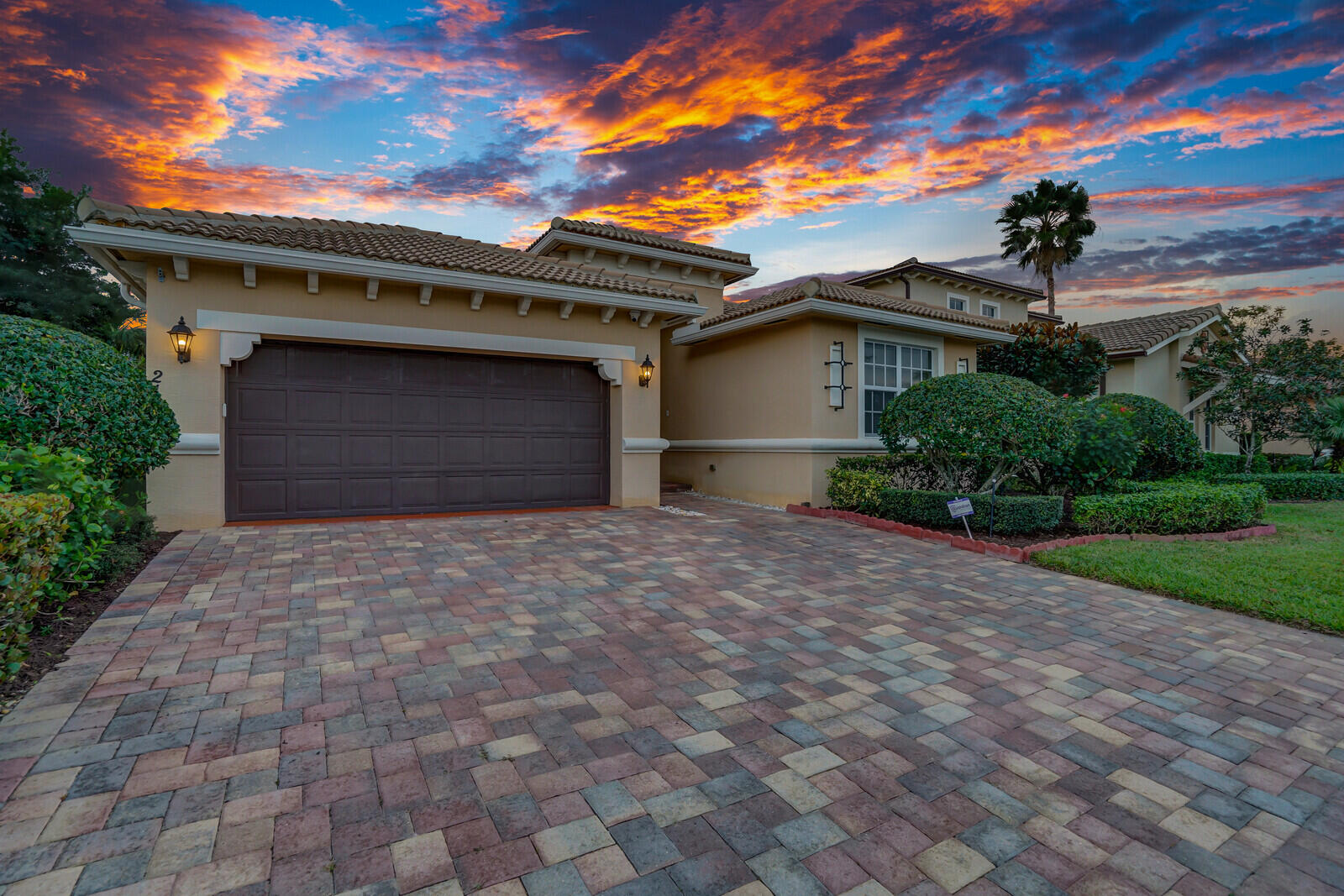 212 Behring Way Jupiter, FL 33458 - Photo 3 of 56 a house view with a garden space