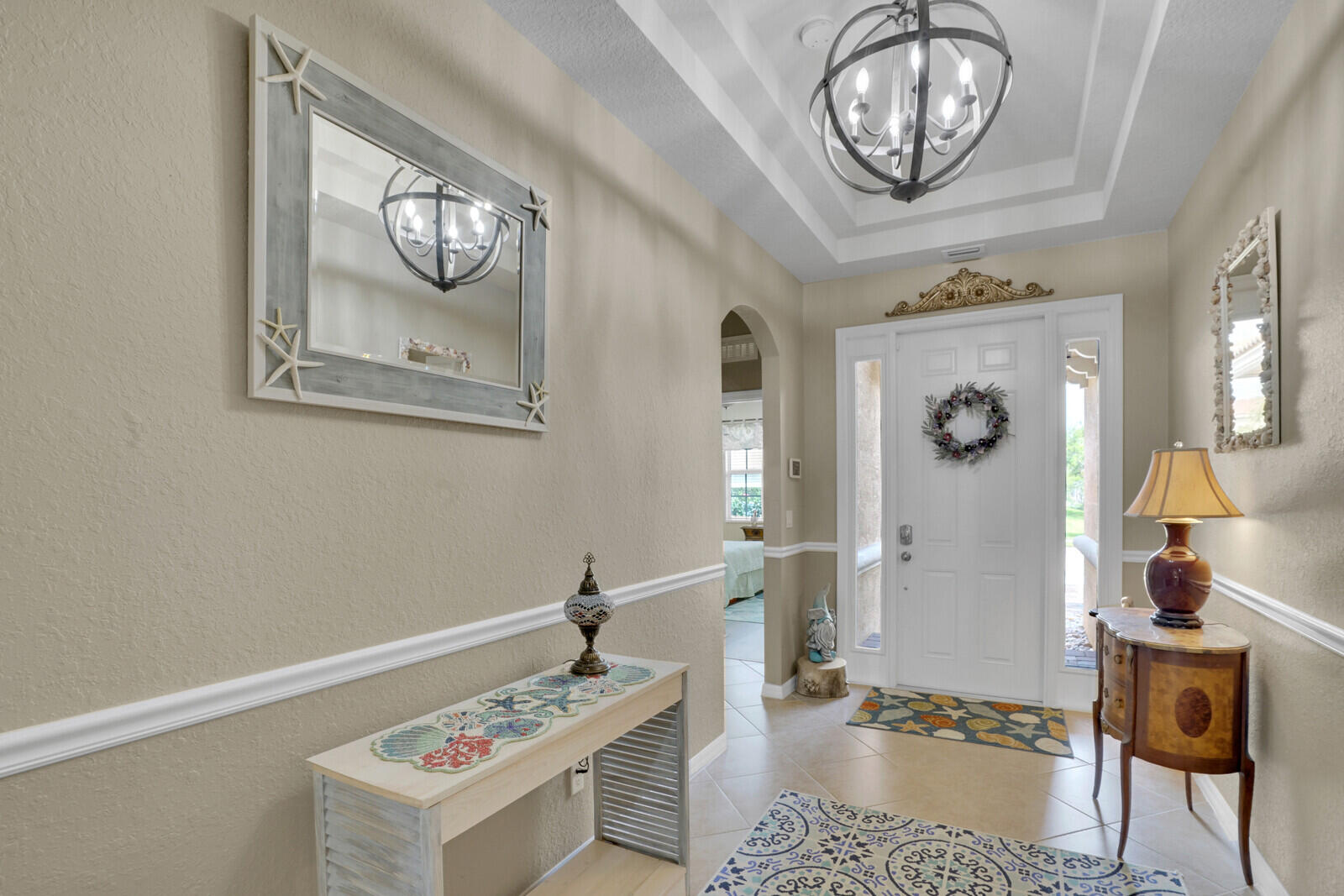 212 Behring Way Jupiter, FL 33458 - Photo 4 of 56 a view of a hallway with elevator