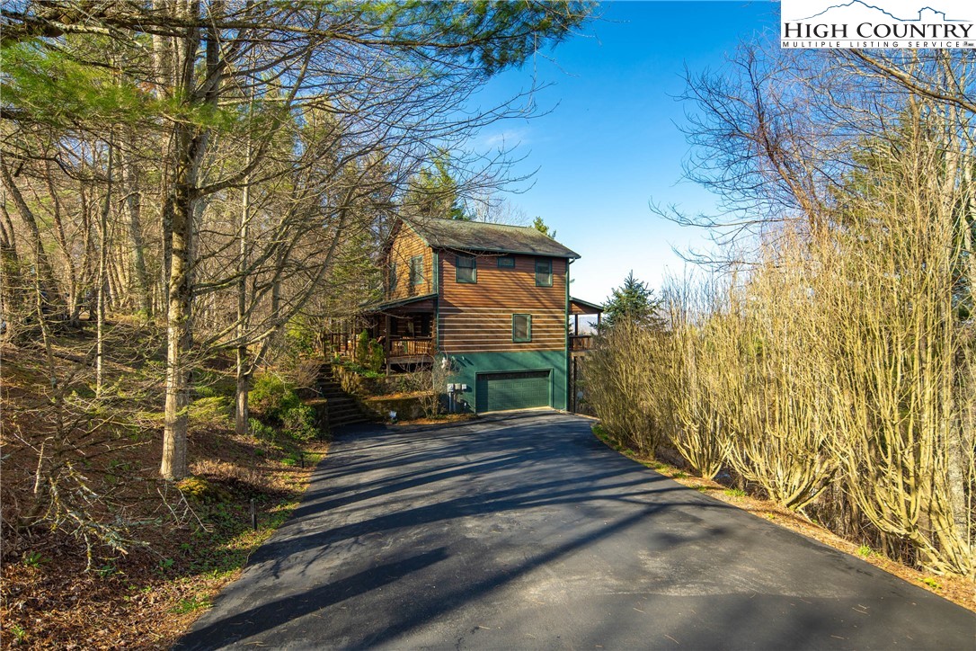 672 Kalmia Lane Boone, NC 28607 - Photo 2 of 41 a view of a pathway both side of building