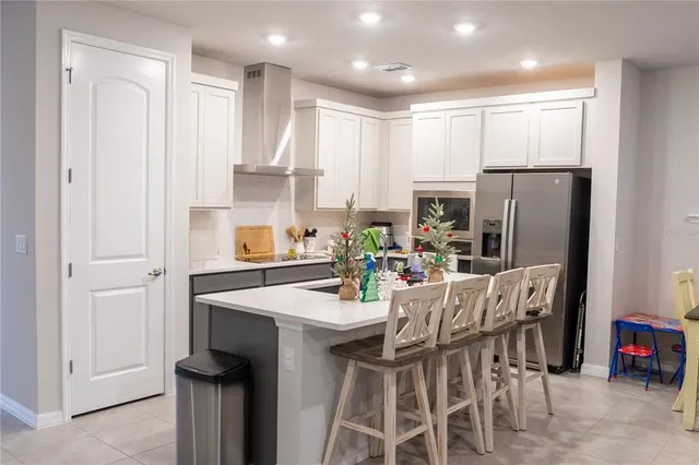 a view of an empty room and a window