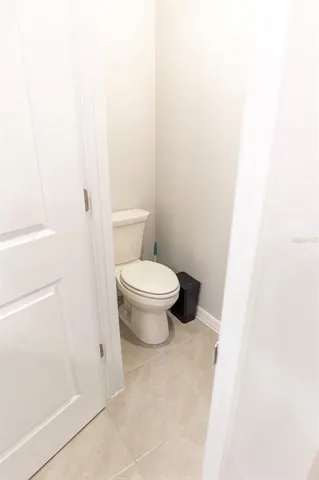 a view of a room that has a window in it