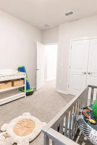 a view of a swimming pool and lounge chair