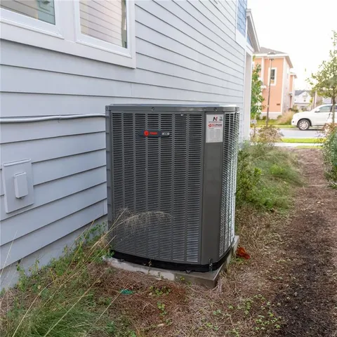 a view of a porch with furniture and a window