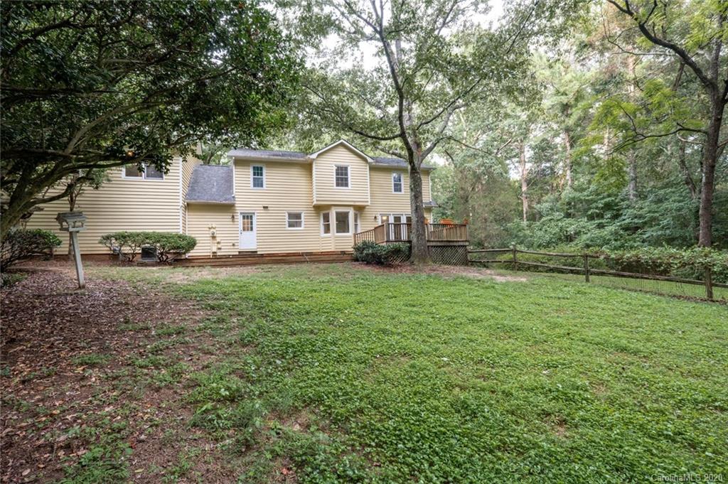 1130 Churchill Road Davidson, NC 28036 - Photo 36 of 38 a front view of a house with garden
