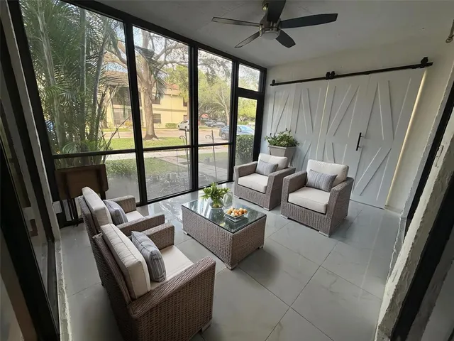 a view of a swimming pool with a patio