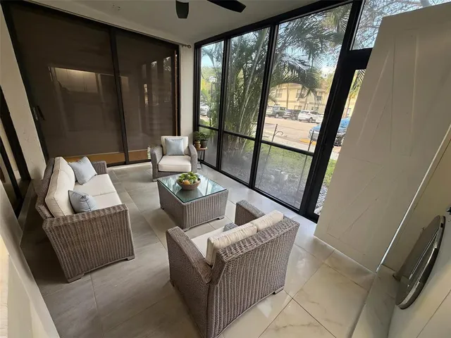 a view of a swimming pool with a yard