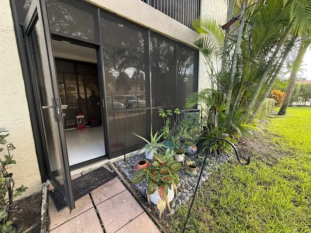 a view of a back yard of the house