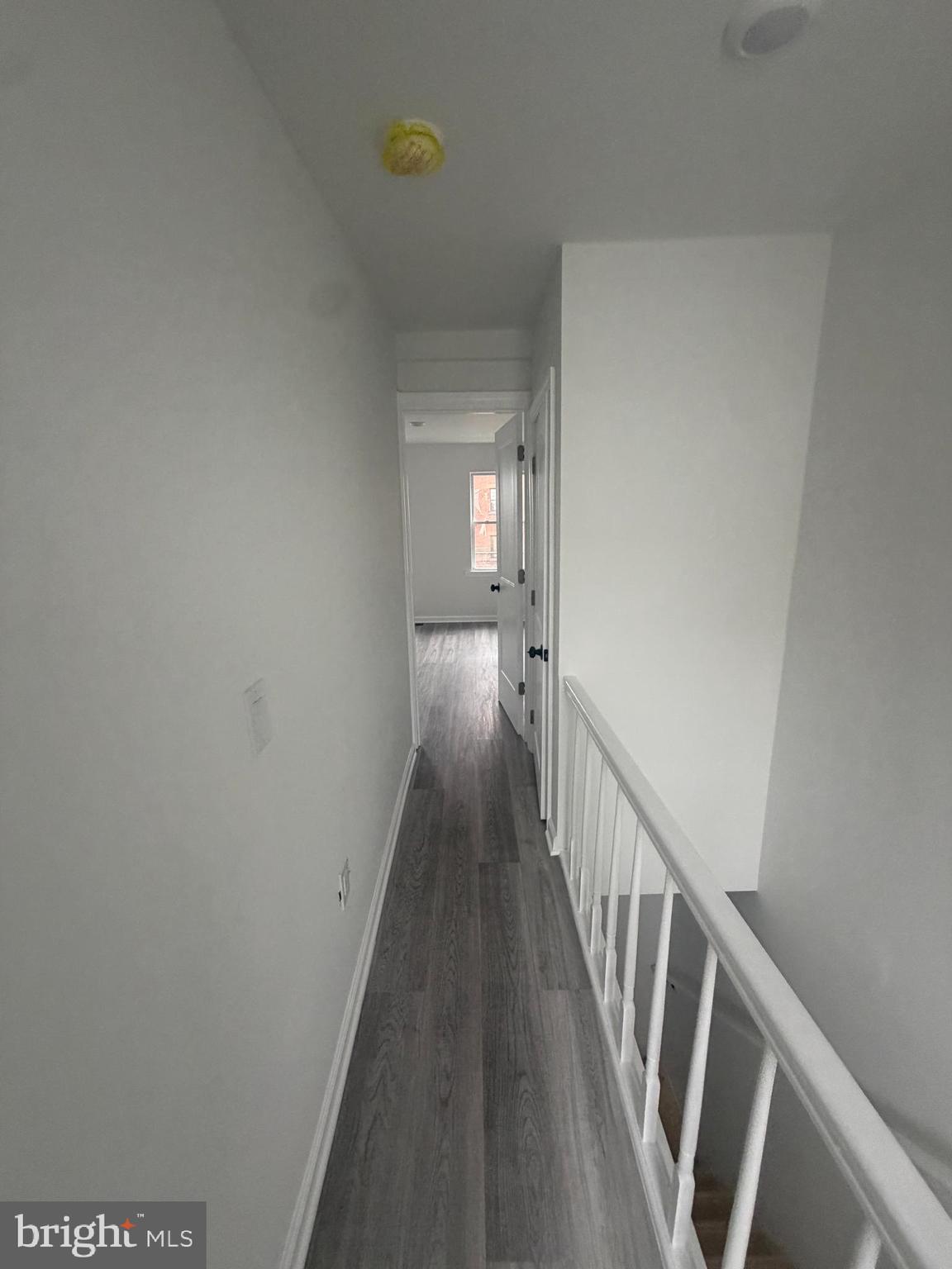 112 East Huntingdon Street, Unit 2 Philadelphia, PA 19125 - Photo 8 of 12 a view of a hallway with wooden floor