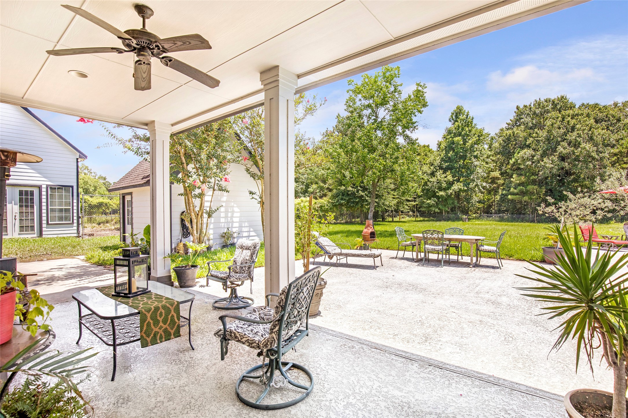 6530 Treaschwig Road, Unit 1 Spring, TX 77373 - Photo 26 of 32 a view of a porch with furniture and a yard