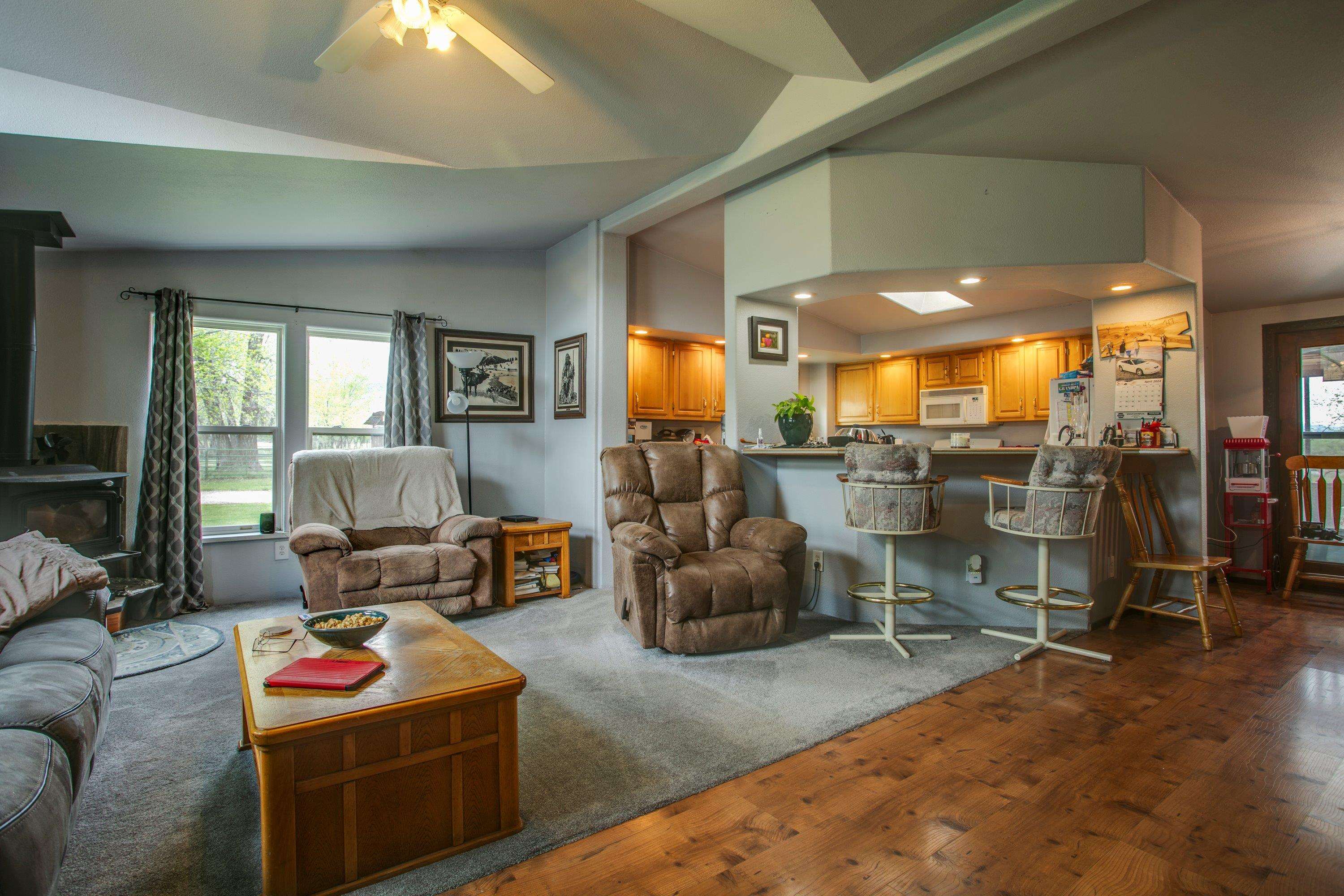 1951 I-70 B Frontage Road De Beque, CO 81630 - Photo 12 of 19 a living room with furniture and a flat screen tv