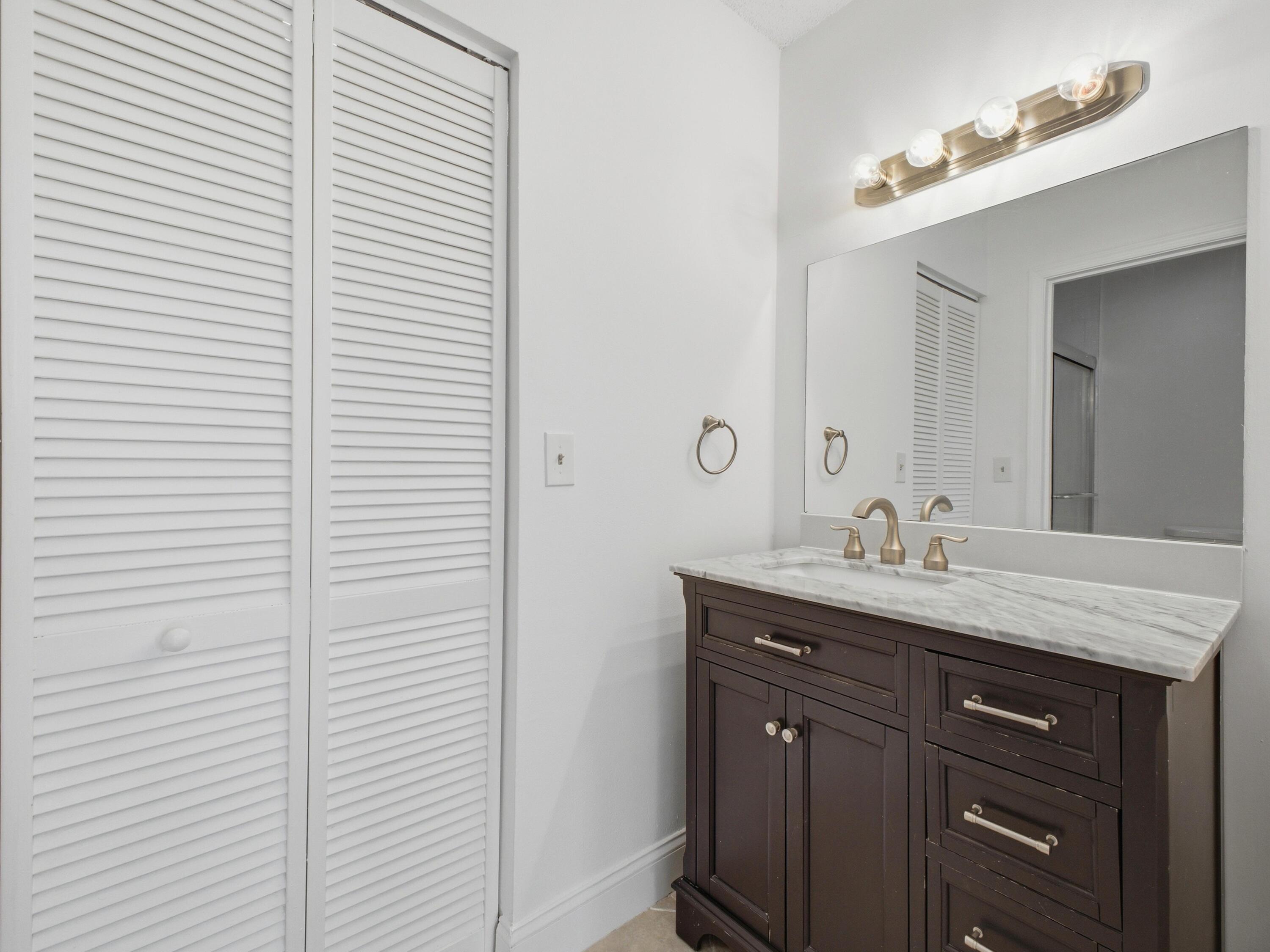 321 Norwood Terrace, Unit N221 Boca Raton, FL 33431 - Photo 28 of 36 Primary Bathroom Vanity