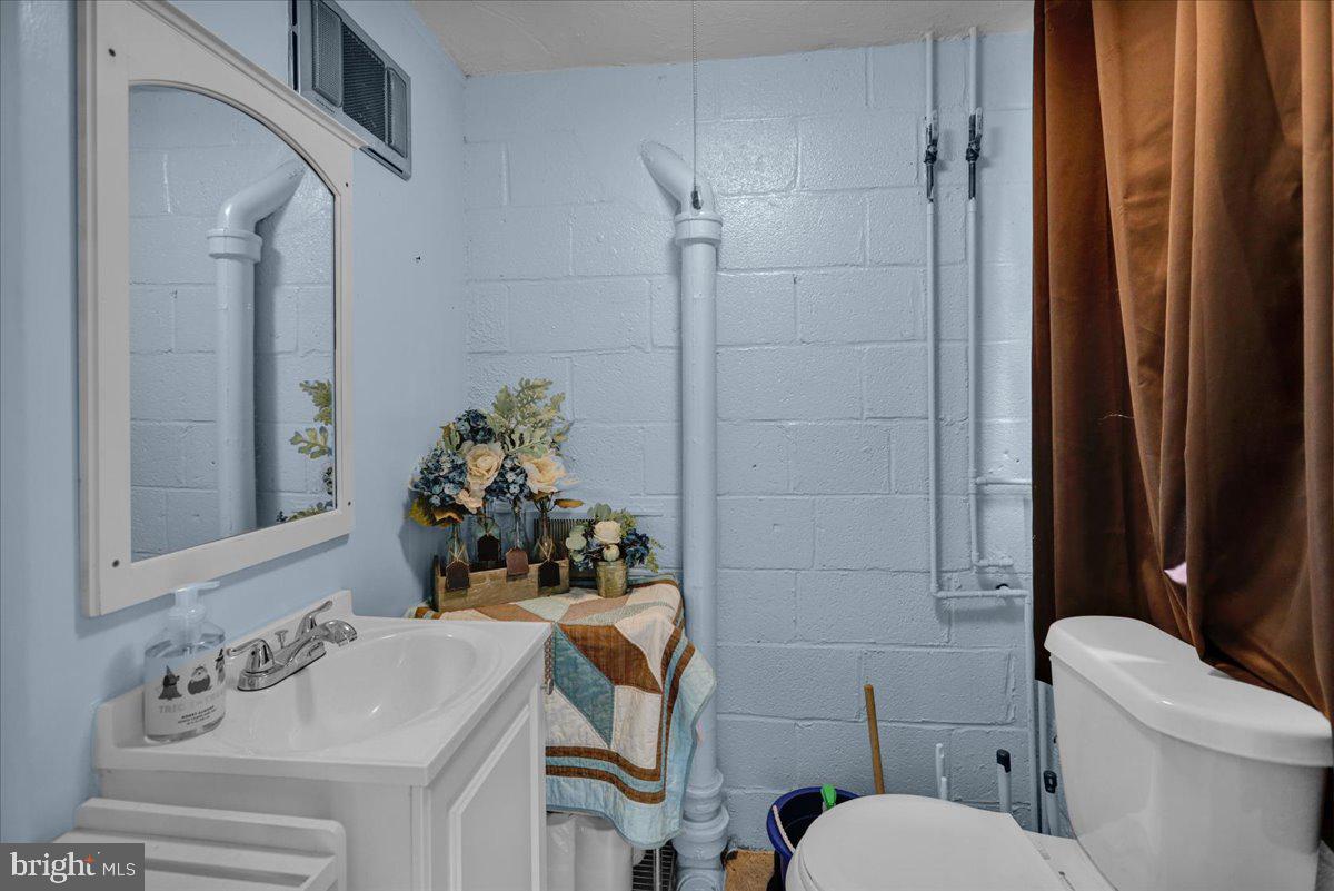 59 Upland Road Reading, PA 19609 - Photo 18 of 30 Half bath off of garage