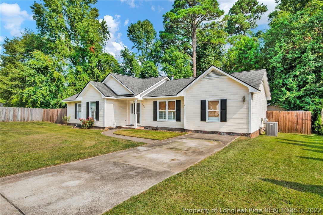 203 Overton Road Raeford, NC 28376 - Photo 3 of 32 a view of a yard in front of house