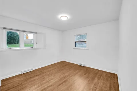 a view of a room that has a window in it