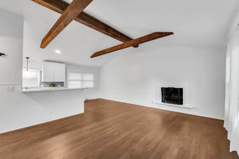 a view of kitchen and microwave