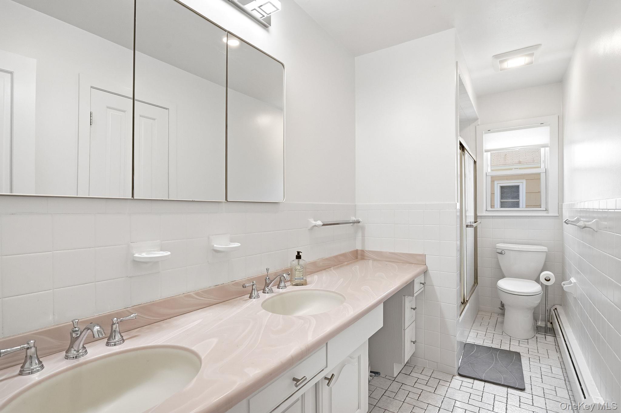 56 Wainwright Street Rye, NY 10580 - Photo 6 of 17 Primary Bathroom with Dual Vanity