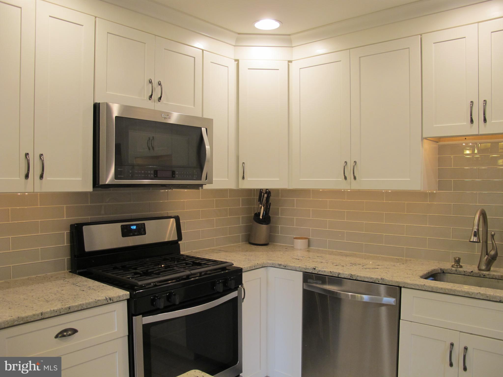 20 Steel Road Havertown, PA 19083 - Photo 16 of 43 Kitchen granite counters & subway tile backsplash