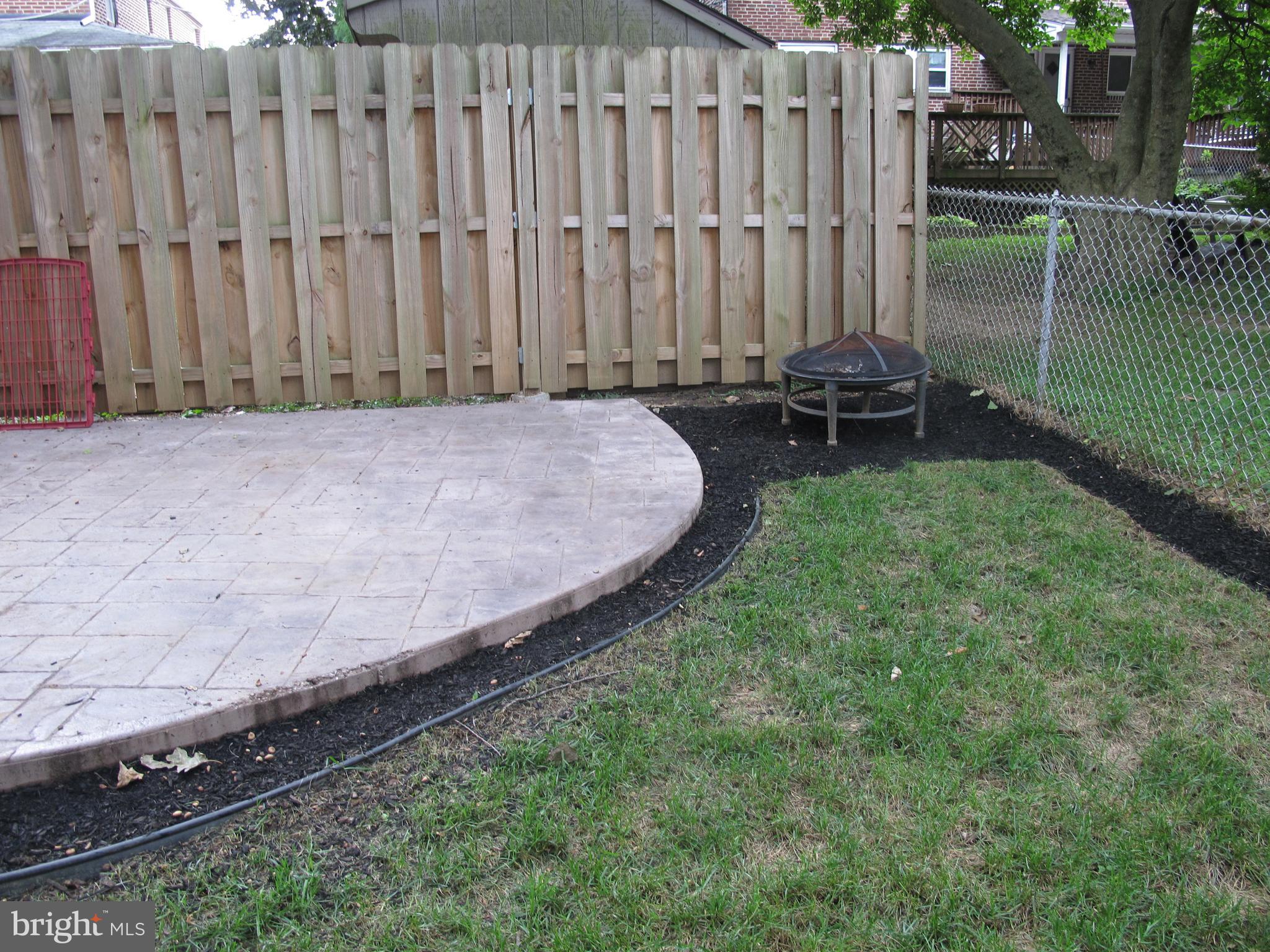 20 Steel Road Havertown, PA 19083 - Photo 40 of 43 Stamped concrete patio with fire pit area