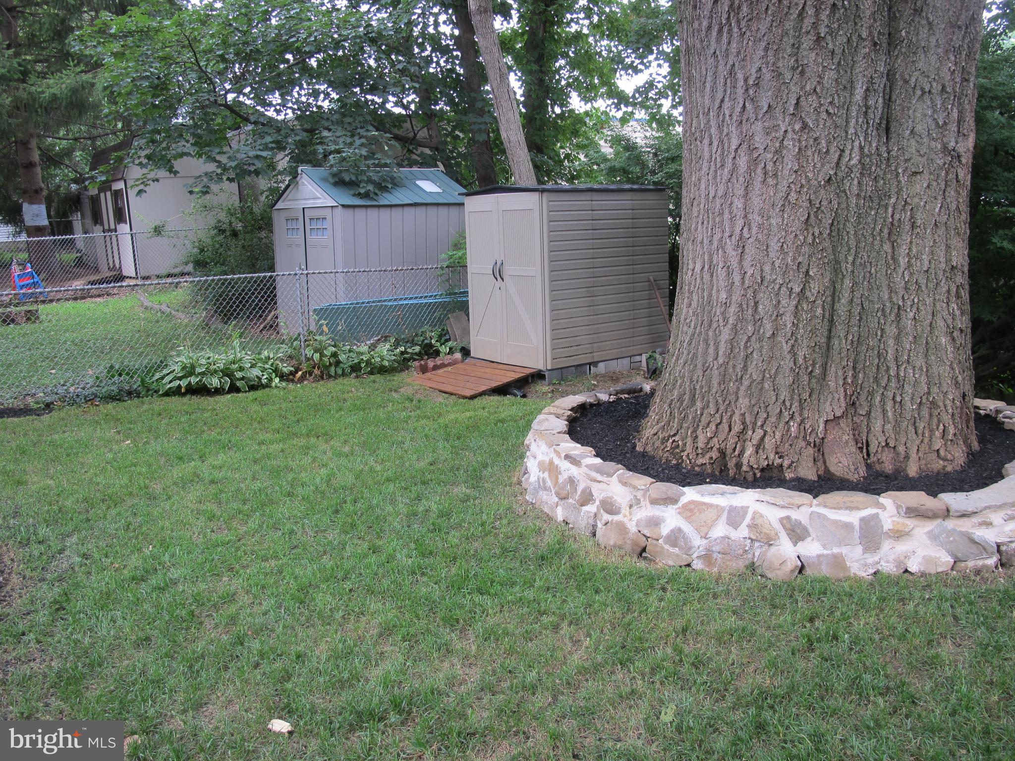 20 Steel Road Havertown, PA 19083 - Photo 41 of 43 Storage shed and shade tree surround
