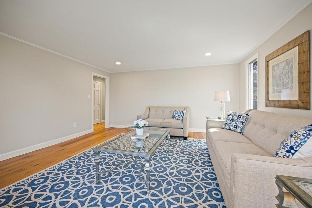 18 Philip Road Lexington, MA 02421 - Photo 11 of 38 a living room with furniture and a rug