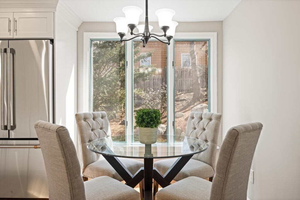 18 Philip Road Lexington, MA 02421 - Photo 18 of 38 a view of a dining room with furniture window and outside view