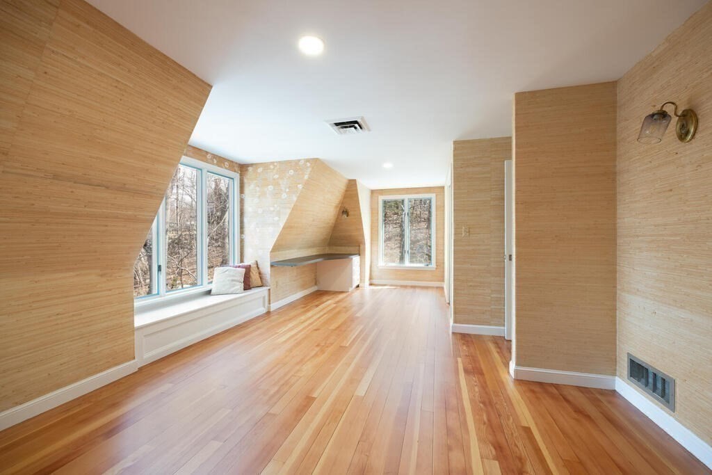 18 Philip Road Lexington, MA 02421 - Photo 30 of 38 a view of a hallway with wooden floor and staircase