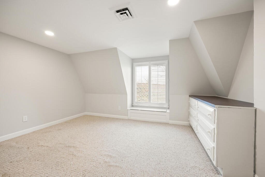 18 Philip Road Lexington, MA 02421 - Photo 31 of 38 a view of an empty room with a window