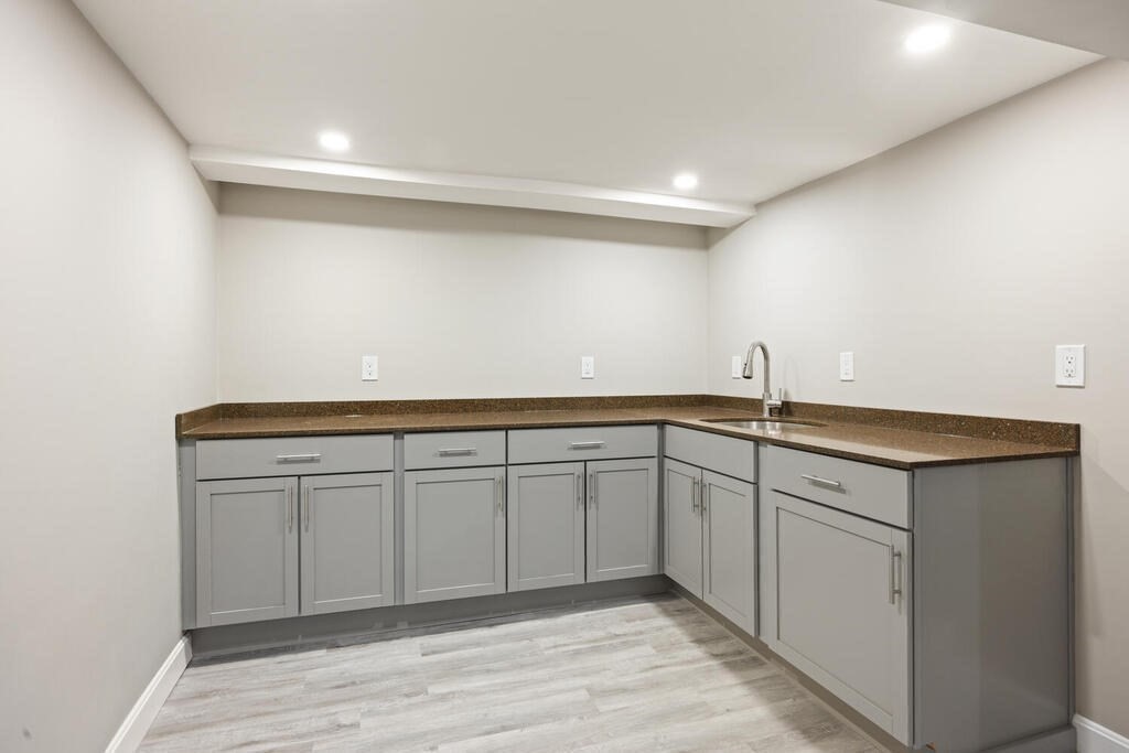 18 Philip Road Lexington, MA 02421 - Photo 33 of 38 a view of cabinets a wooden floor and entryway