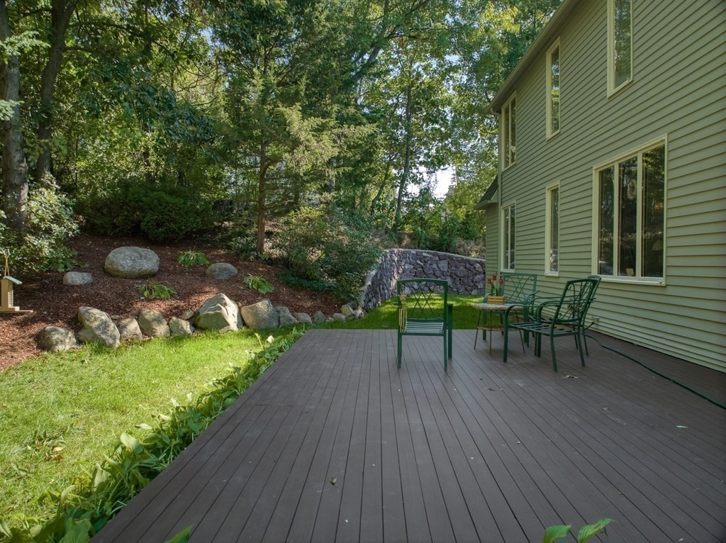 18 Philip Road Lexington, MA 02421 - Photo 36 of 38 a deck with chair and table of garden