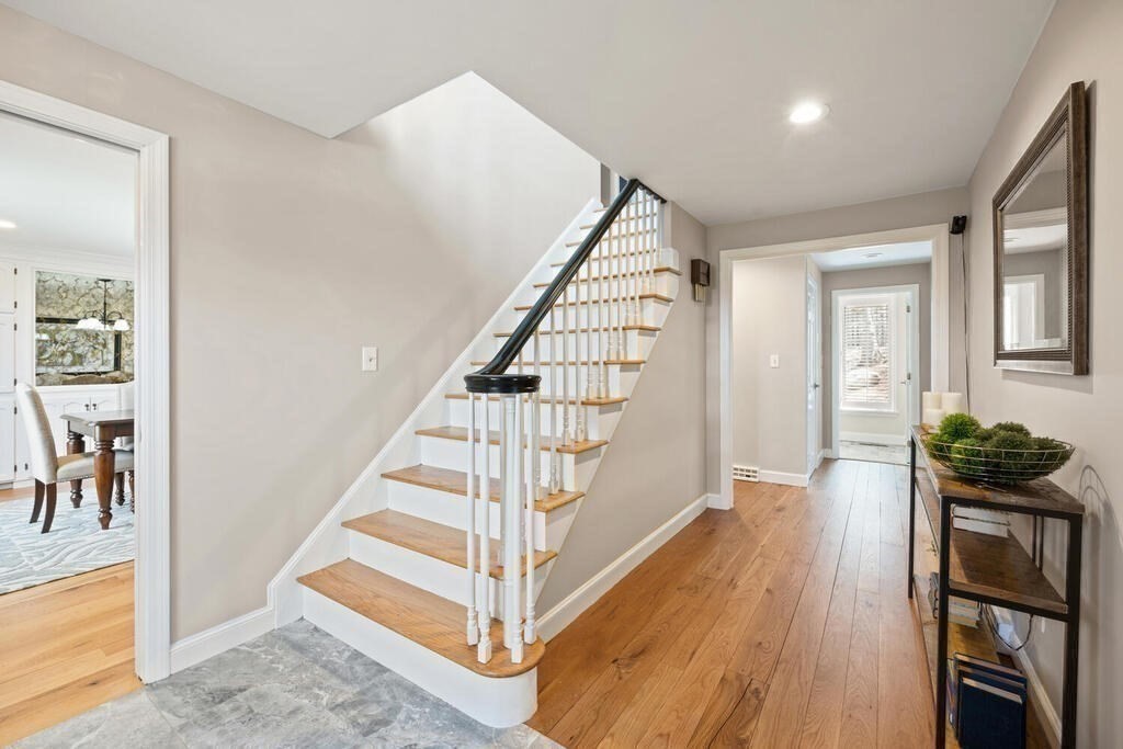 18 Philip Road Lexington, MA 02421 - Photo 8 of 38 a view of entryway and hall with wooden floor