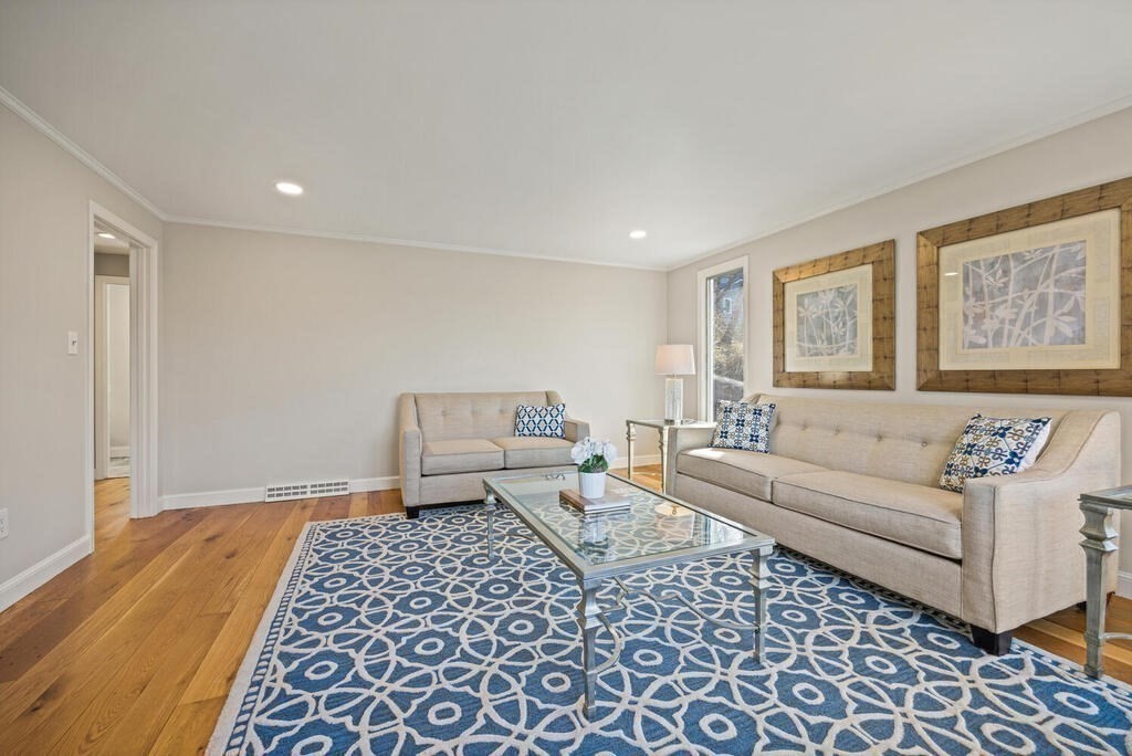 18 Philip Road Lexington, MA 02421 - Photo 9 of 38 a living room with furniture and a rug