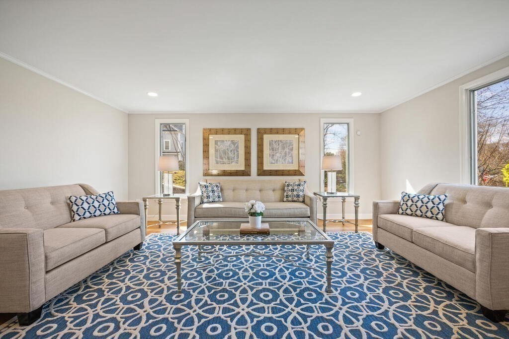 18 Philip Road Lexington, MA 02421 - Photo 10 of 38 a living room with furniture and a couch