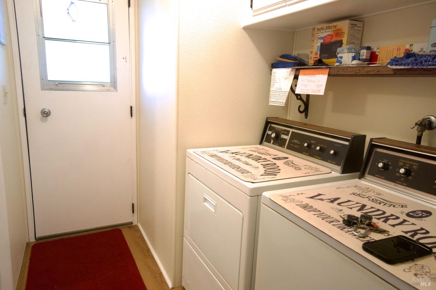 41 Plymouth Way Santa Rosa, CA 95403 - Photo 27 of 28 Laundry room with back door to the carport