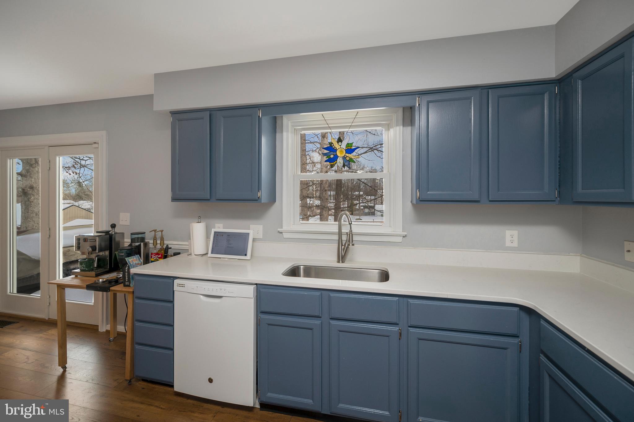 228 Choptank Road Stafford, VA 22556 - Photo 19 of 56 a kitchen with a sink cabinets and wooden floor