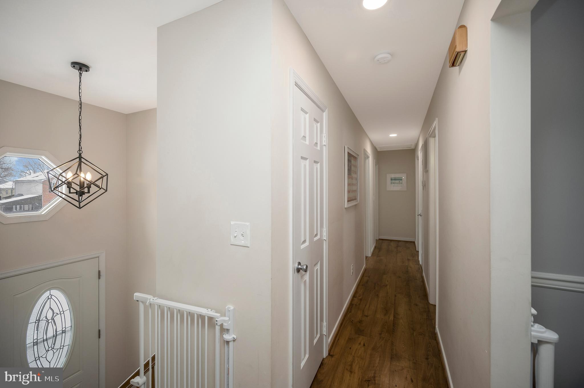 228 Choptank Road Stafford, VA 22556 - Photo 25 of 56 a view of a hallway with wooden floor