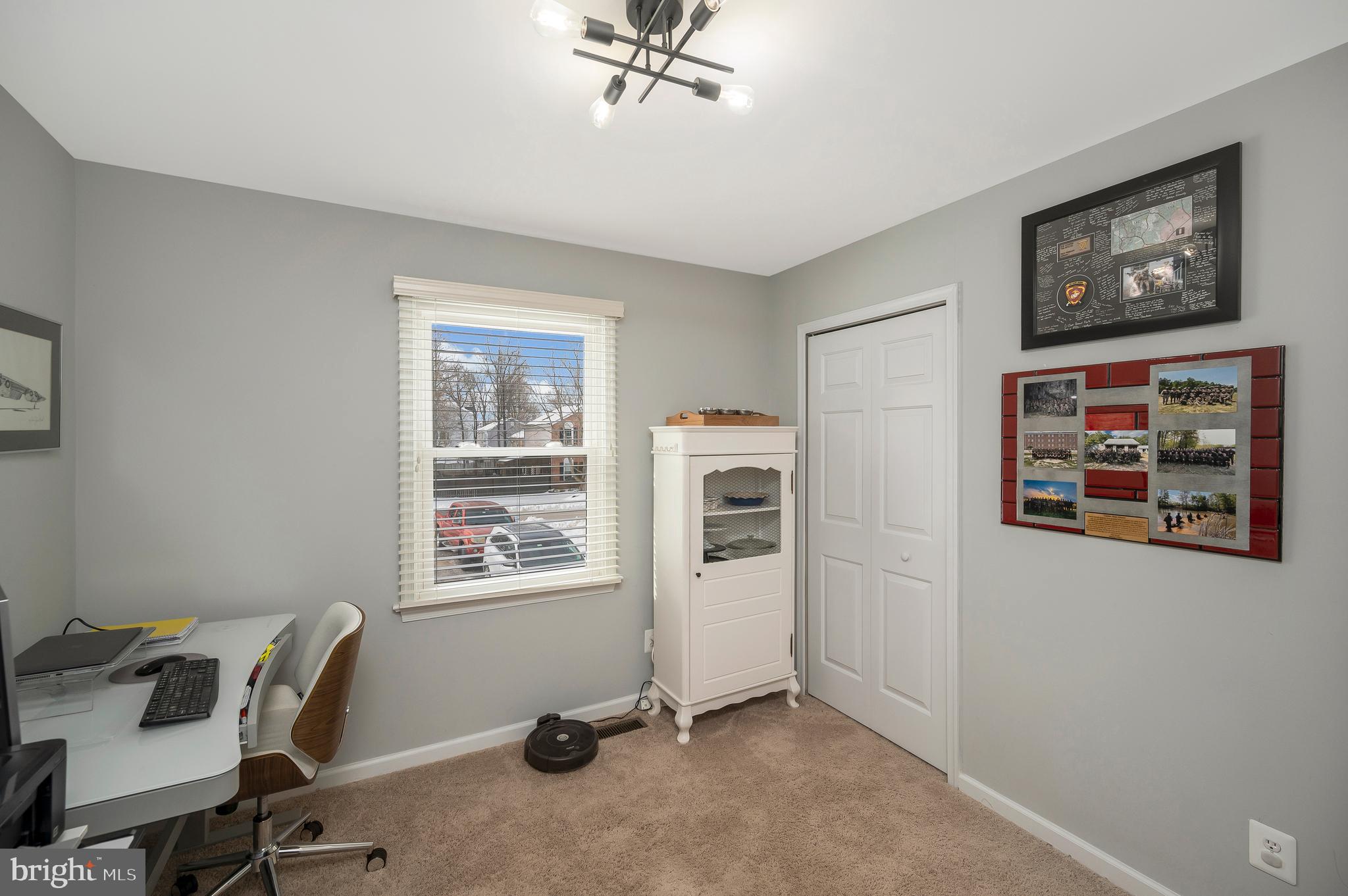 228 Choptank Road Stafford, VA 22556 - Photo 28 of 56 a view of a workspace with furniture and a window