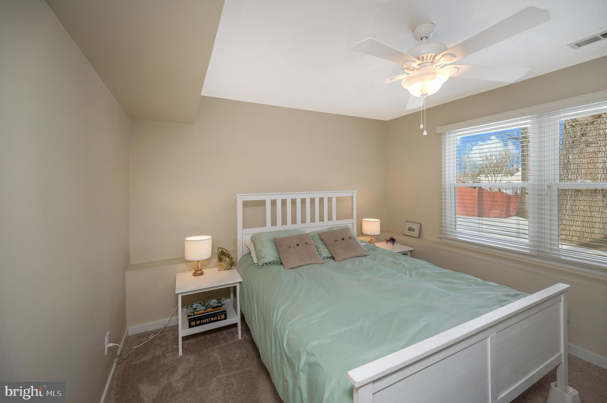 228 Choptank Road Stafford, VA 22556 - Photo 43 of 56 a bedroom with a bed and a window