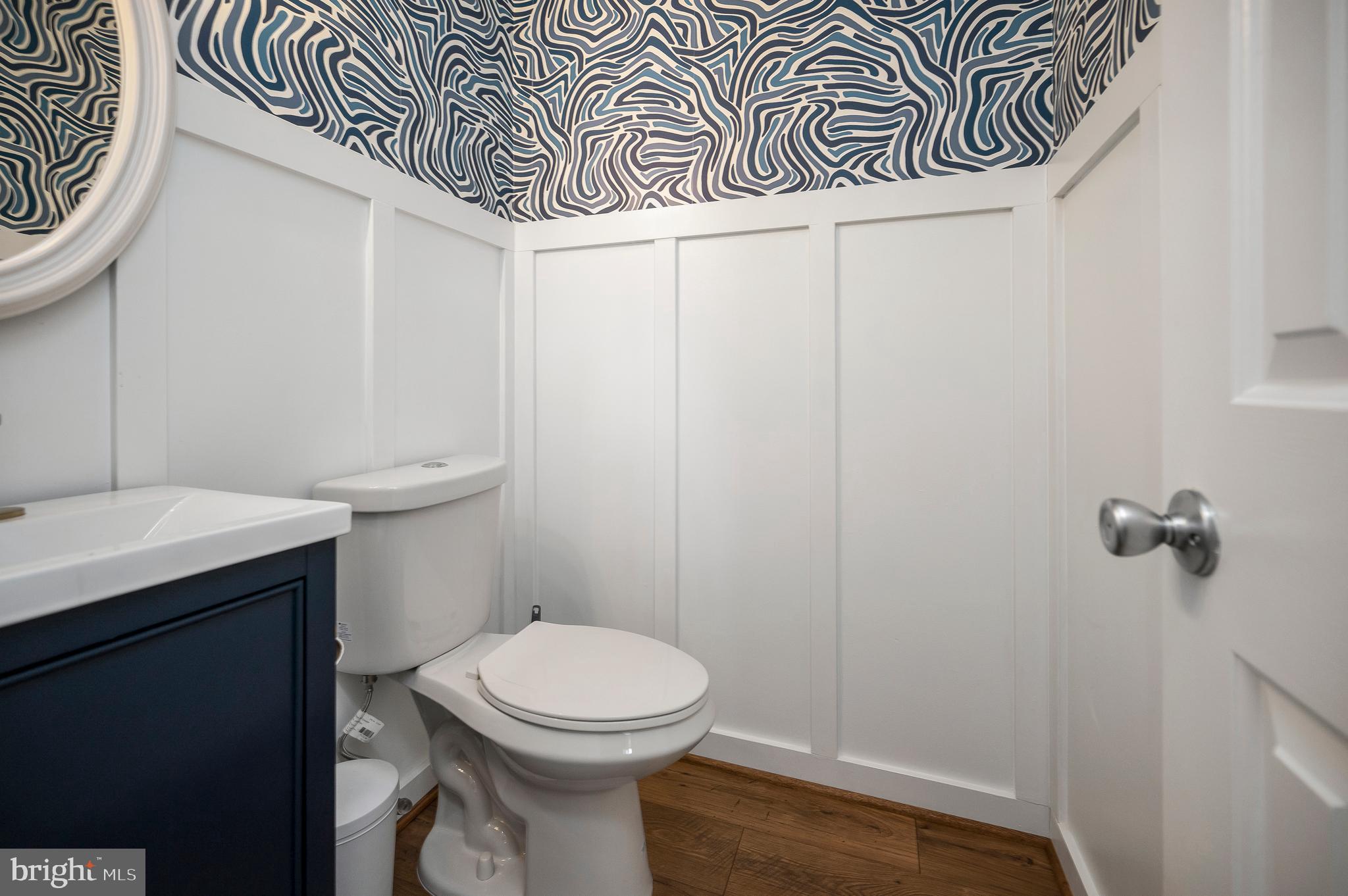 228 Choptank Road Stafford, VA 22556 - Photo 45 of 56 a bathroom with a sink a toilet and a mirror