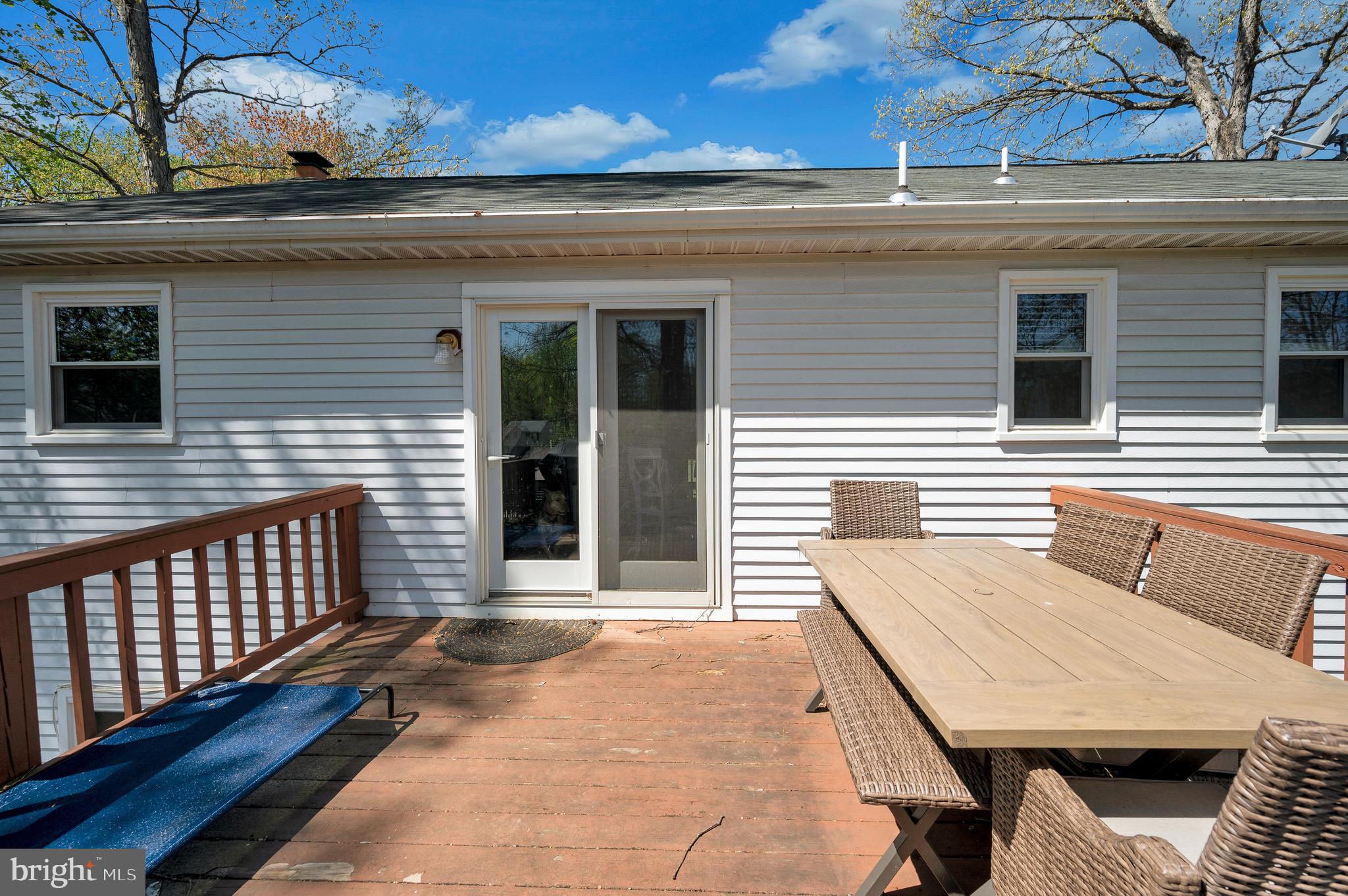 228 Choptank Road Stafford, VA 22556 - Photo 51 of 56 a view of a patio with table and chairs with wooden floor