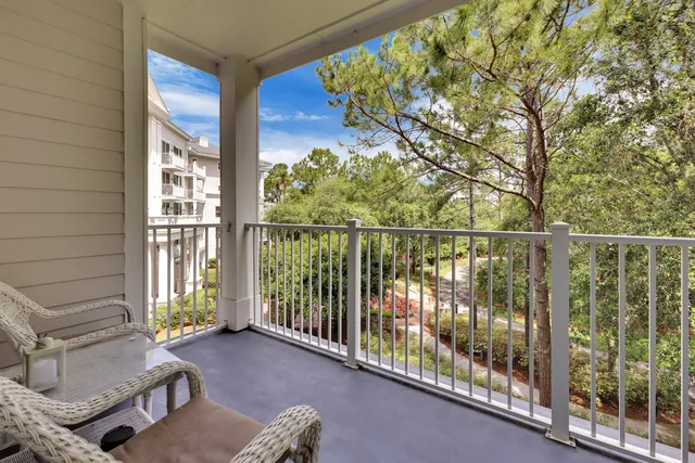 a view of a chairs in the balcony