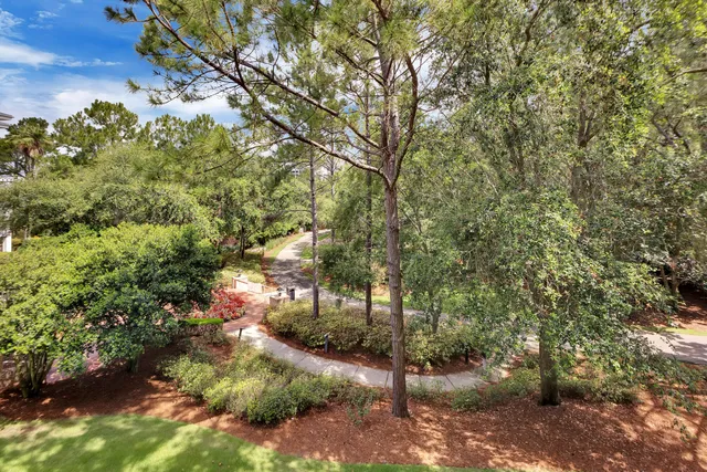 a spacious bedroom with a bed and a couch