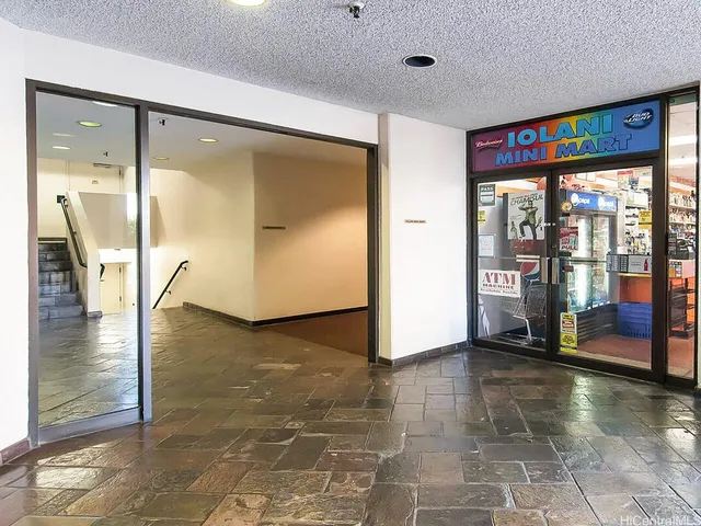 a view of a hallway with a large window