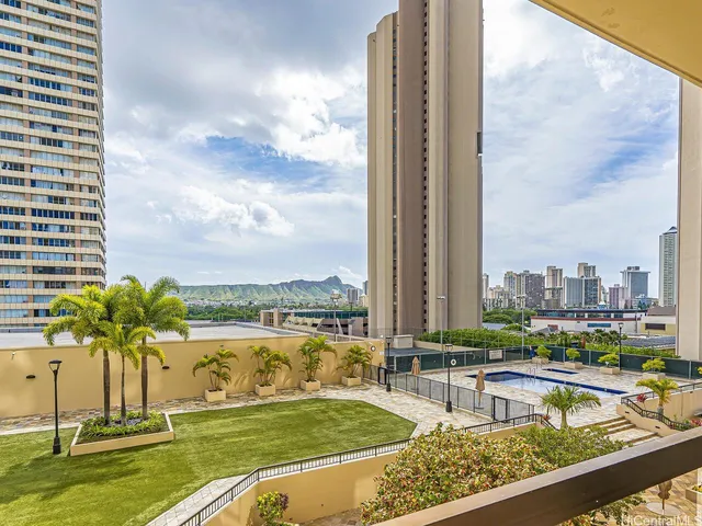 a view of a swimming pool with a terrace