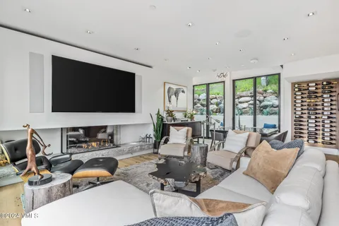 a view of a living room and dining room