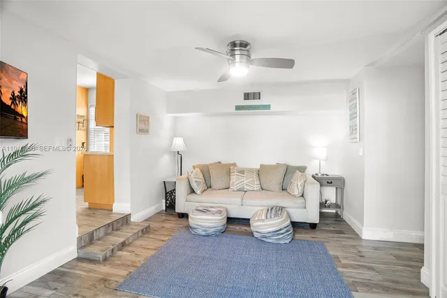 a living room with furniture and a couch